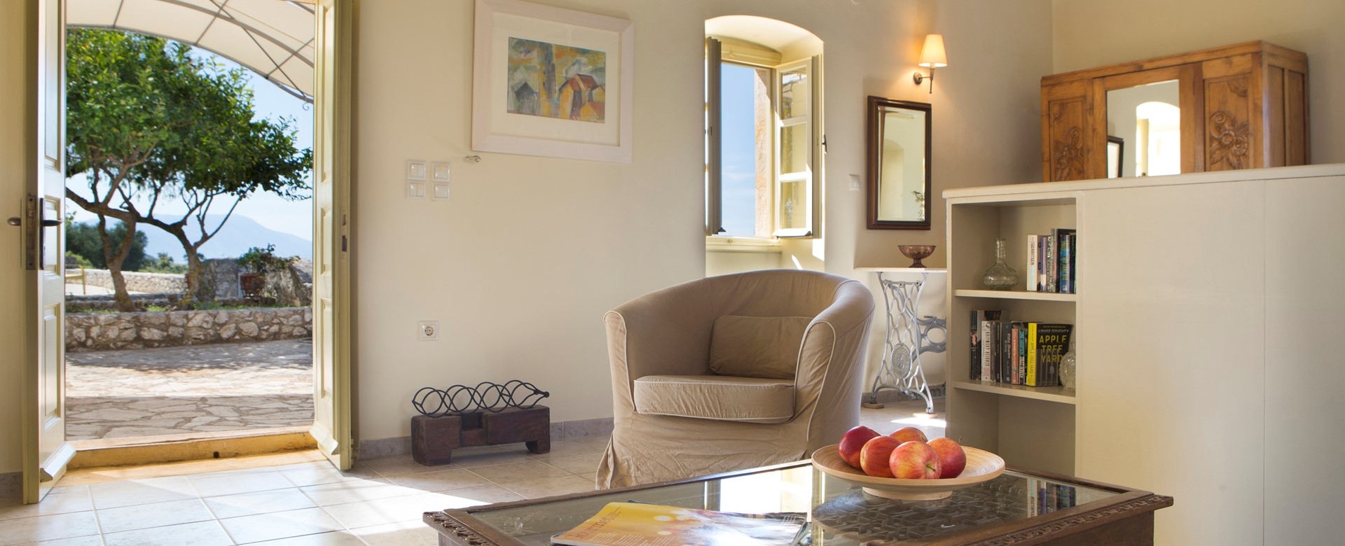 Tub chair with a view inside Lemoni Cottage, Fiscardo, Kefalonia