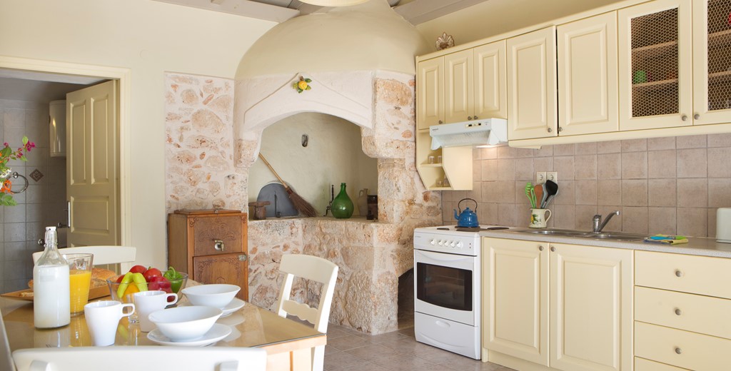 Dining and kitchen inside Lemoni Cottage, Fiscardo, Kefalonia