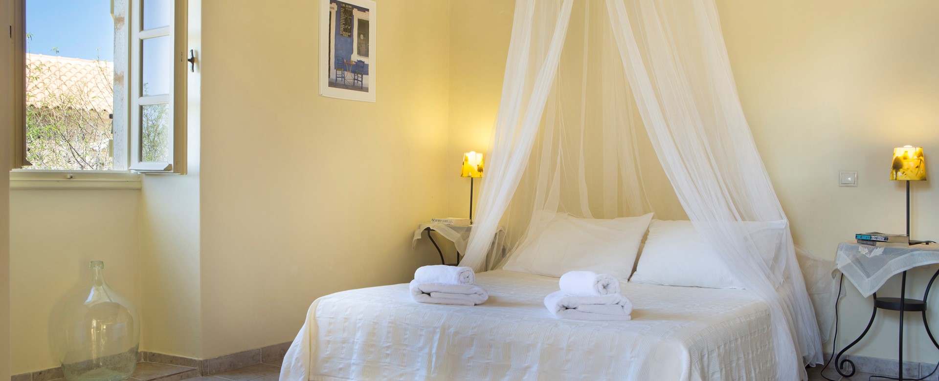 Master bedroom with king sized double bed perfect for a romantic holiday inside Lemoni Cottage, Fiscardo, Kefalonia