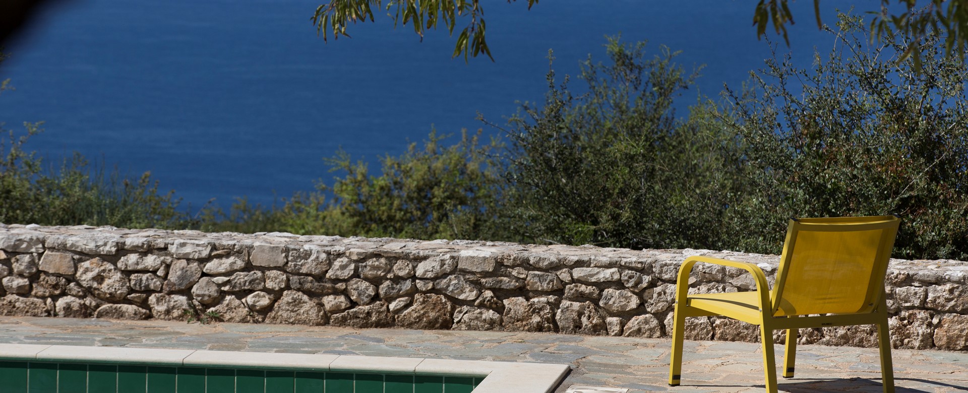 Lounge back and enjoy the views next to the pool on the terrace outside Lemoni Cottage, Fiscardo, Kefalonia