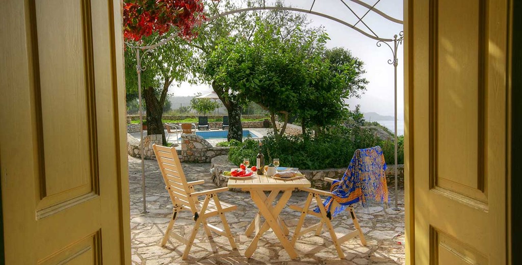 Private evening al fresco dinner together outside Lemoni Cottage, Fiscardo, Kefalonia