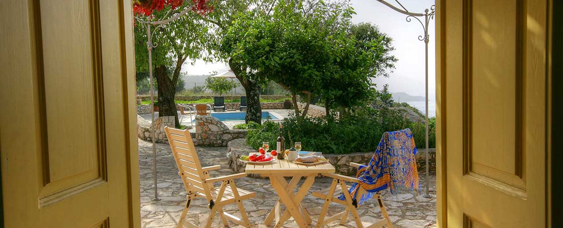 Private evening al fresco dinner together outside Lemoni Cottage, Fiscardo, Kefalonia