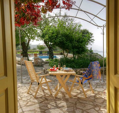 Private evening al fresco dinner together outside Lemoni Cottage, Fiscardo, Kefalonia