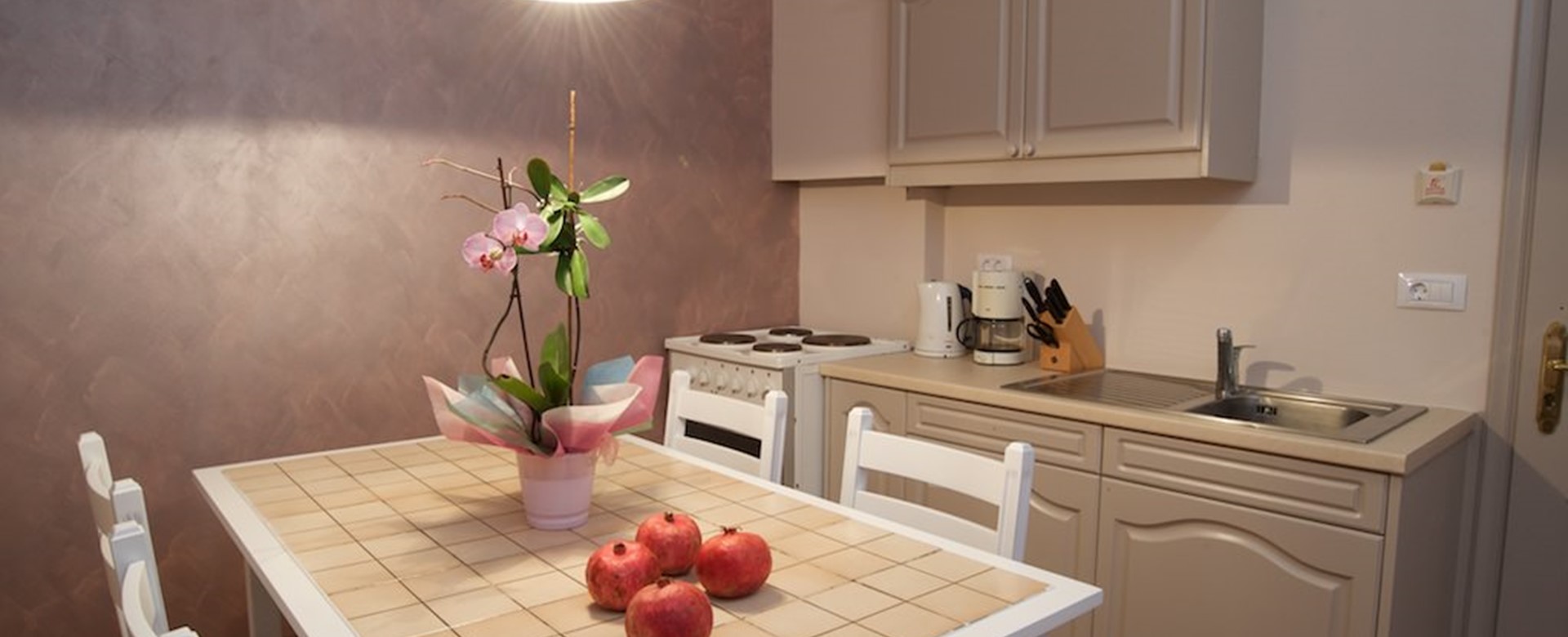 Dining and kitchen space inside Magnolia Apartments, Fiscardo, Kefalonia, Greek Islands
