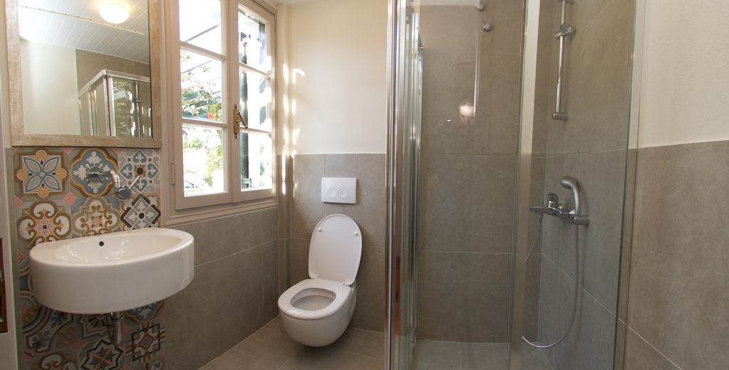 Bathroom with shower and basin inside Magnolia Apartments, Fiscardo, Kefalonia, Greek Islands