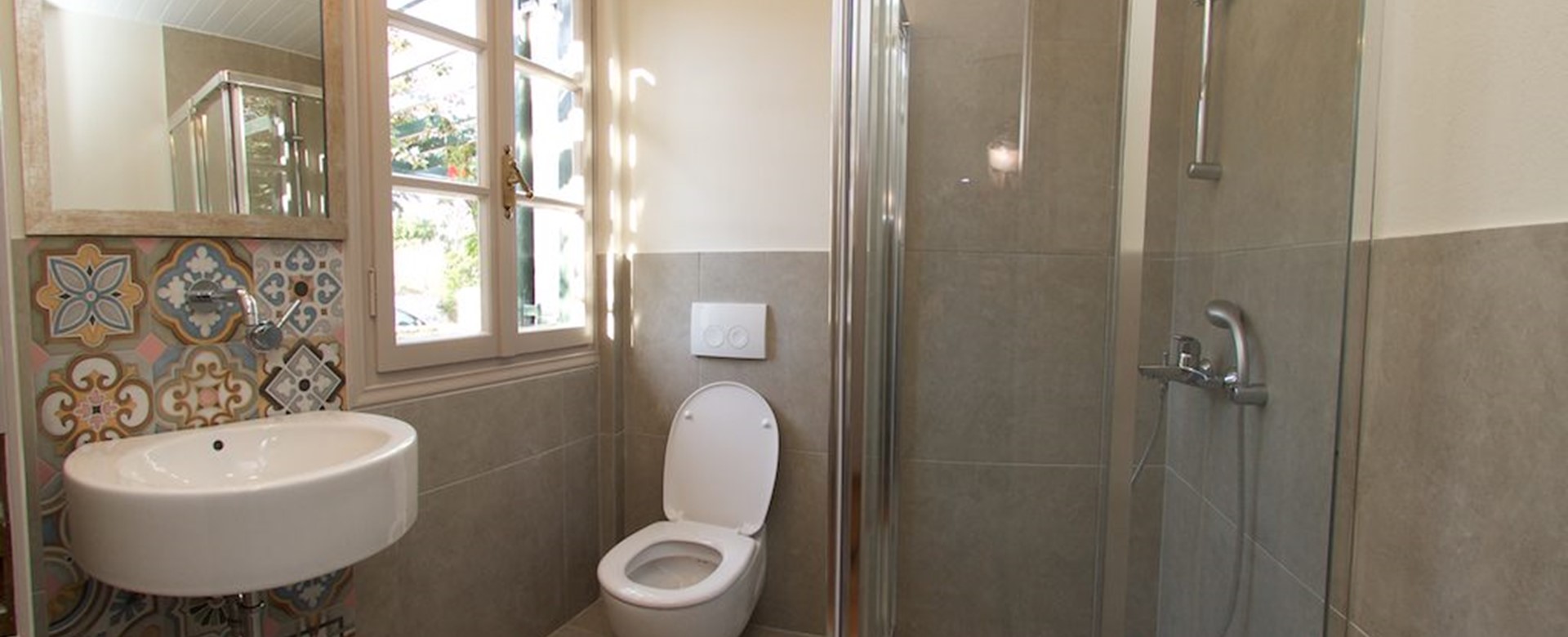 Bathroom with shower and basin inside Magnolia Apartments, Fiscardo, Kefalonia, Greek Islands