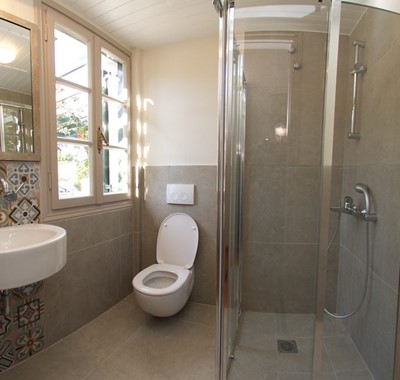 Bathroom with shower and basin inside Magnolia Apartments, Fiscardo, Kefalonia, Greek Islands