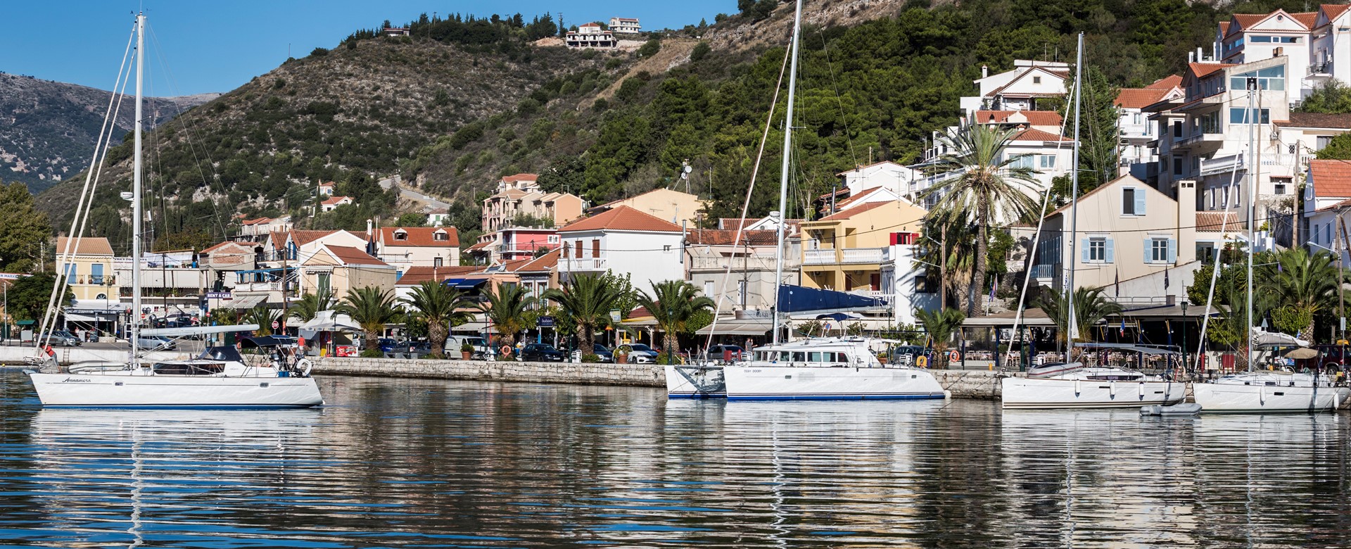Looking back to Palm House Harbourfront Mansion from the harbour of Agia Efimia, Kefalonia, Greek Islands