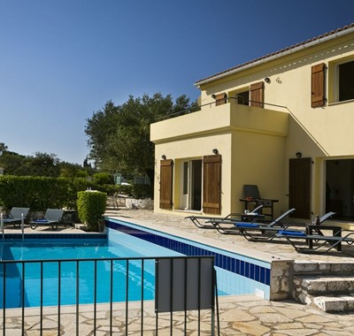 Private pool and sun bathing terraces outside Villa Cypress, Fiscardo, Kefalonia, Greek Islands