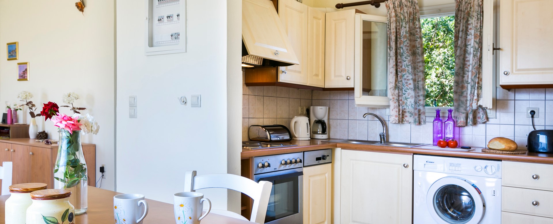Fitted kitchen with washing machine has everything you need for a stay in Villa Cypress, Fiscardo, Kefalonia, Greek Islands