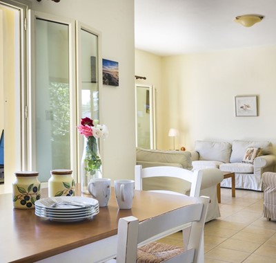 Dining and living space inside Villa Cypress, Fiscardo, Kefalonia, Greek Islands