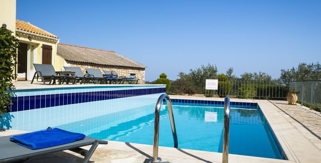 Cool off in the pool while sunbathing at Villa Cypress, Fiscardo, Kefalonia, Greek Islands