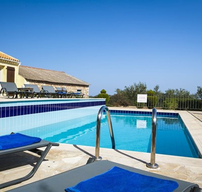 Cool off in the pool while sunbathing at Villa Cypress, Fiscardo, Kefalonia, Greek Islands