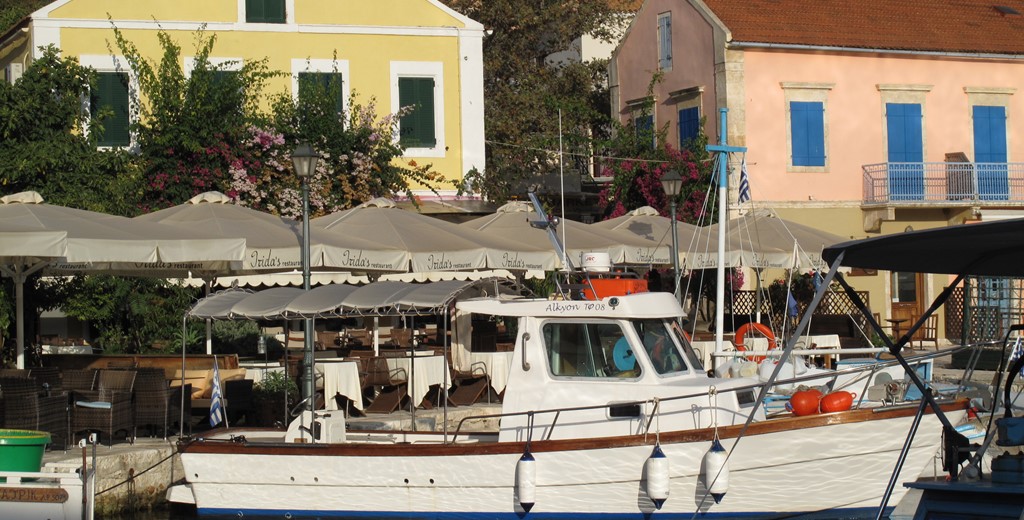 Local water front with restaurants and boats at Villa Lithia, Fiscardo, Kefalonia, Greek Islands