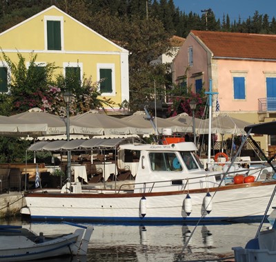 Local water front with restaurants and boats at Villa Lithia, Fiscardo, Kefalonia, Greek Islands