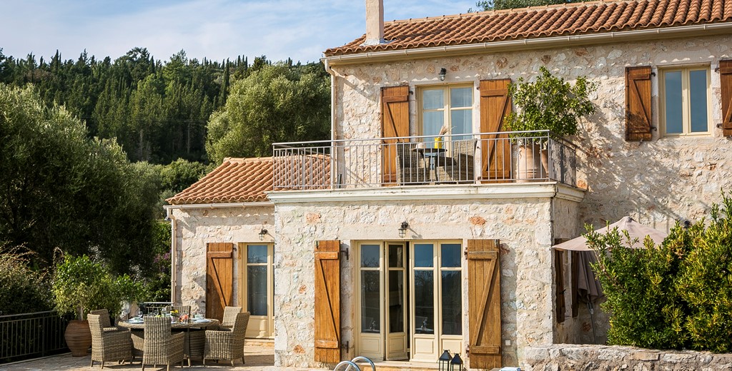 Rustic traditional stone Villa Pelagia with balcony and French doors in Fiscardo, Kefalonia, Greek Islands