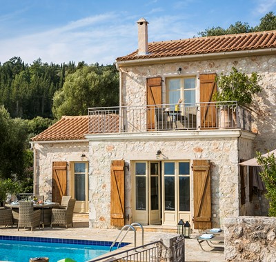 Rustic traditional stone Villa Pelagia with balcony and French doors in Fiscardo, Kefalonia, Greek Islands