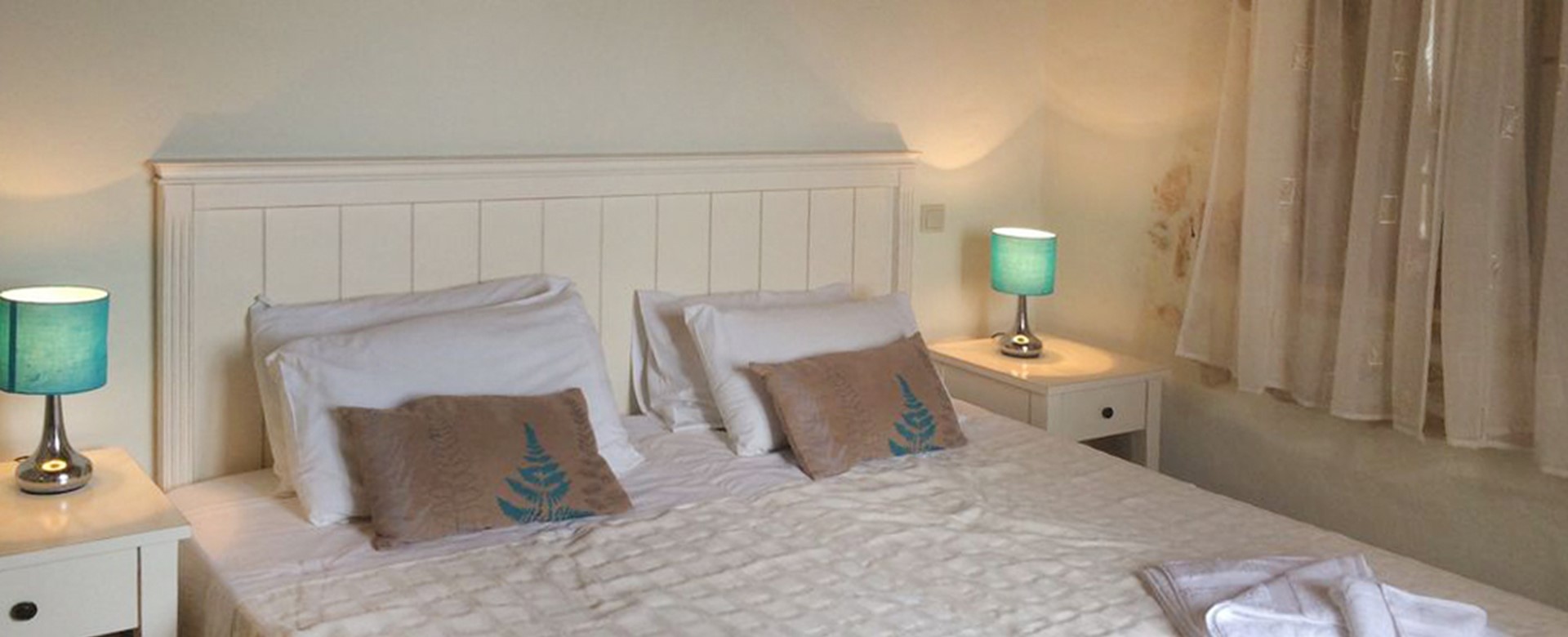 Master bedroom with large double bed in Villa Pelagia, Fiscardo, Kefalonia, Greek Islands