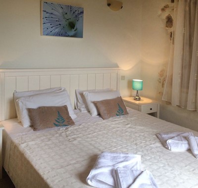 Master bedroom with large double bed in Villa Pelagia, Fiscardo, Kefalonia, Greek Islands