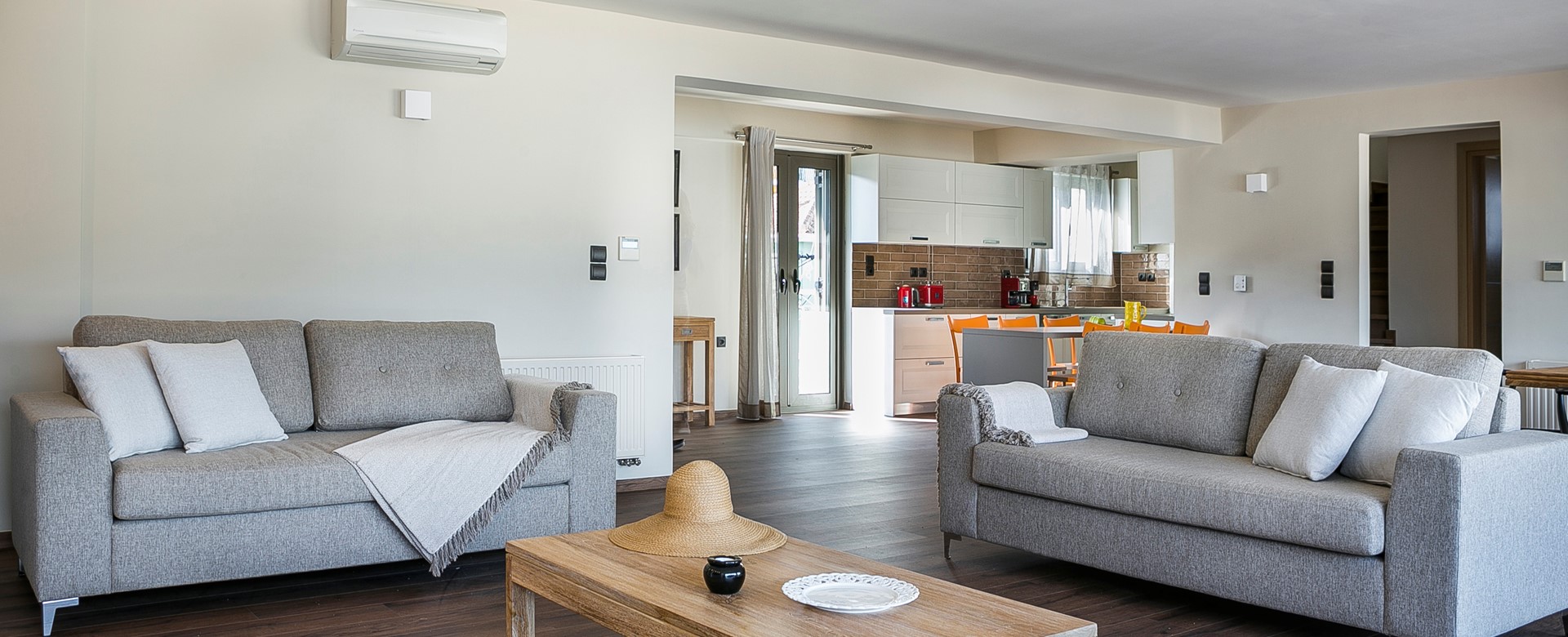 Open plan and spacious lounge dining and kitchen space inside Marina Penthouse Apartment, Argostoli, Kefalonia, Greek Islands