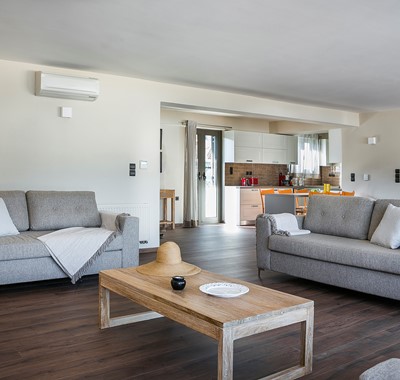 Open plan and spacious lounge dining and kitchen space inside Marina Penthouse Apartment, Argostoli, Kefalonia, Greek Islands