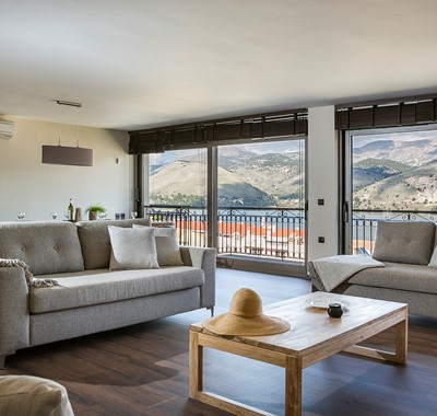 Panoramic views of the bay and surrounding hills inside or out on the balcony of Marina Penthouse Apartment, Argostoli, Kefalonia, Greek Islands