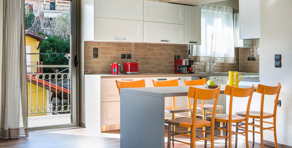 Breakfast bar along with the kitchen space to the rear of Marina Penthouse Apartment, Argostoli, Kefalonia, Greek Islands