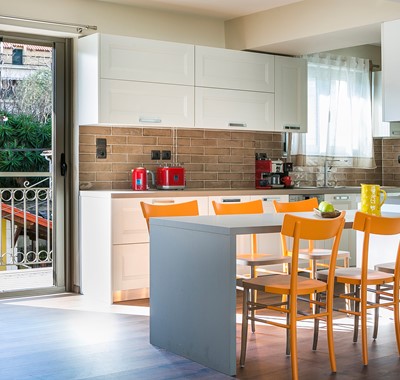 Breakfast bar along with the kitchen space to the rear of Marina Penthouse Apartment, Argostoli, Kefalonia, Greek Islands