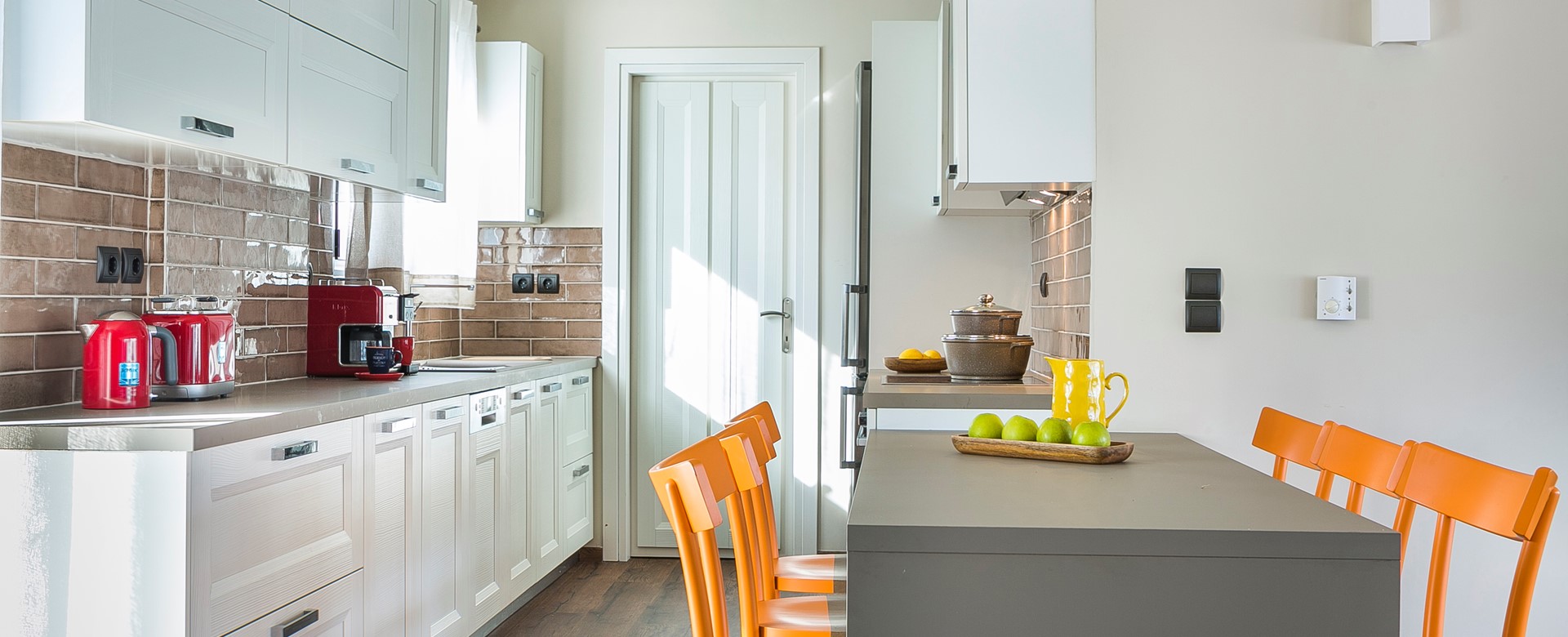 Modern equipped fitted kitchen and breakfast bar in Marina Penthouse Apartment, Argostoli, Kefalonia, Greek Islands