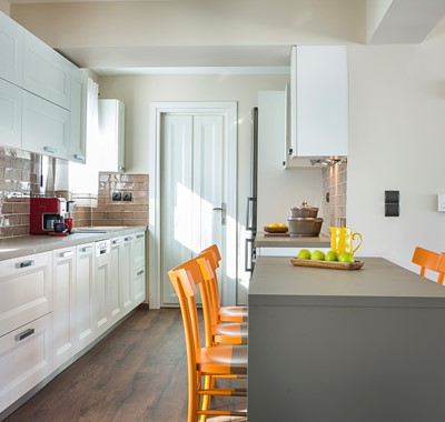 Modern equipped fitted kitchen and breakfast bar in Marina Penthouse Apartment, Argostoli, Kefalonia, Greek Islands