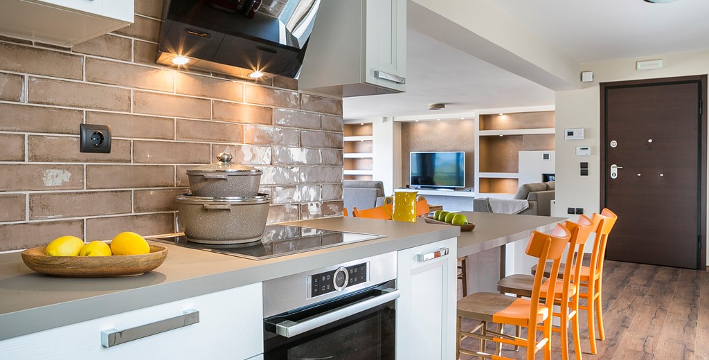 Modern clean and spacious open plan kitchen and living space inside Marina Penthouse Apartment, Argostoli, Kefalonia, Greek Islands