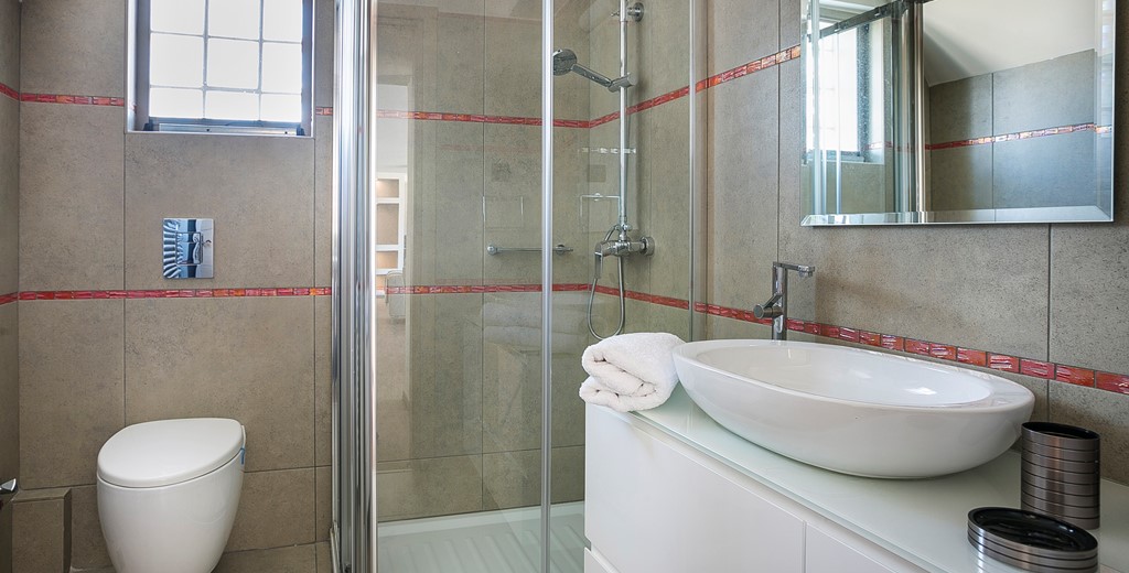 Bathroom with modern fittings and shower inside Marina Penthouse Apartment, Argostoli, Kefalonia, Greek Islands