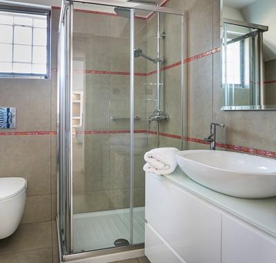 Bathroom with modern fittings and shower inside Marina Penthouse Apartment, Argostoli, Kefalonia, Greek Islands