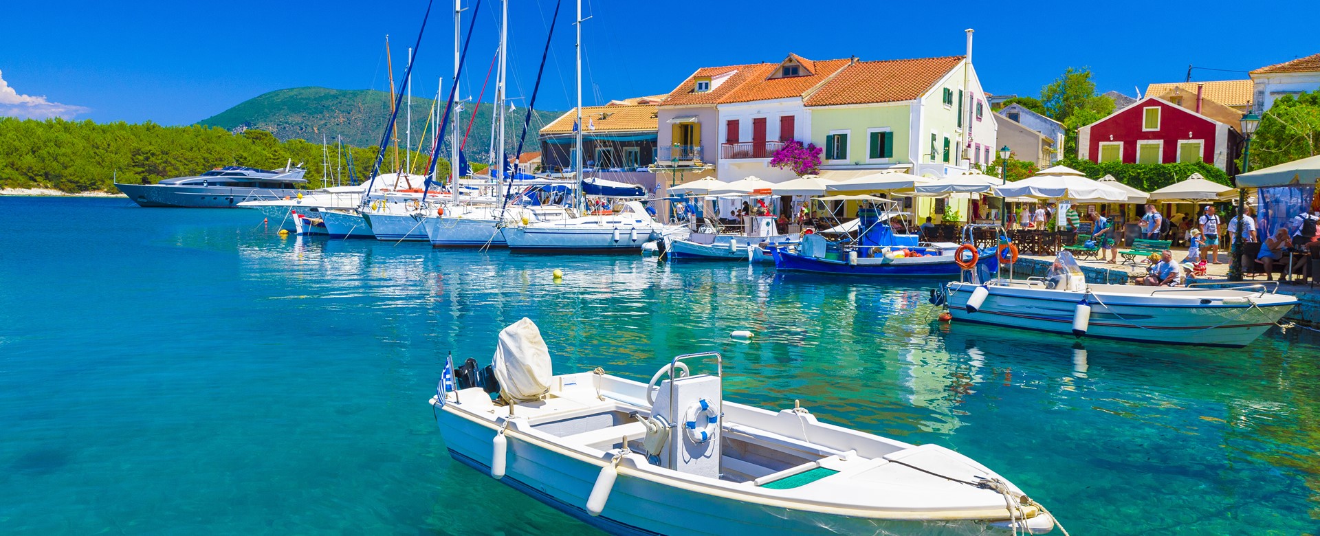 Boats for hire and charter in Fiskardo village harbor, Kefalonia, Greek Islands and boat hire