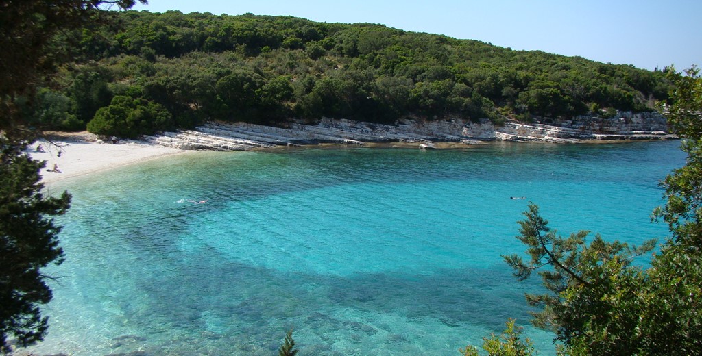 Crystal clear blue water Emblisi Beach, Fiscardo, Kefalonia, Greek Islands