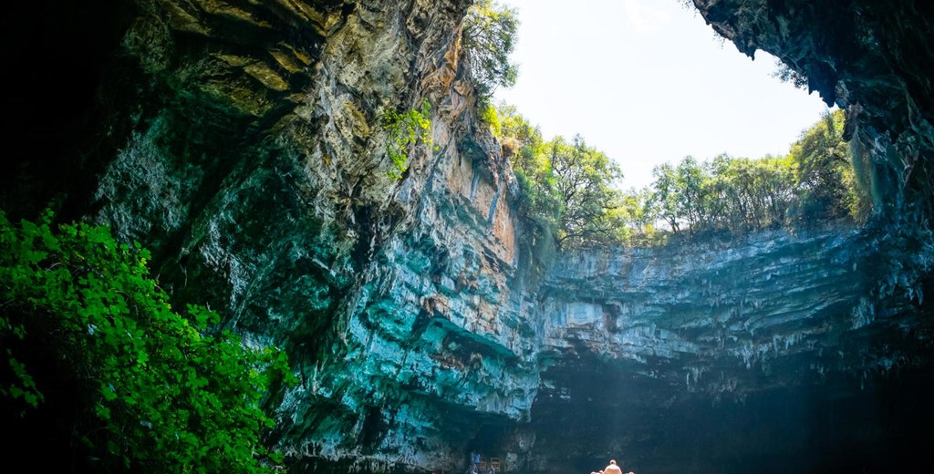The tourist hotspot landmark Melissani Cave and Lake near Karavomilos, Kefalonia, Greek Islands